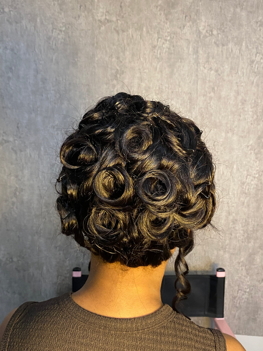 Bombshell French roll updo with bangs