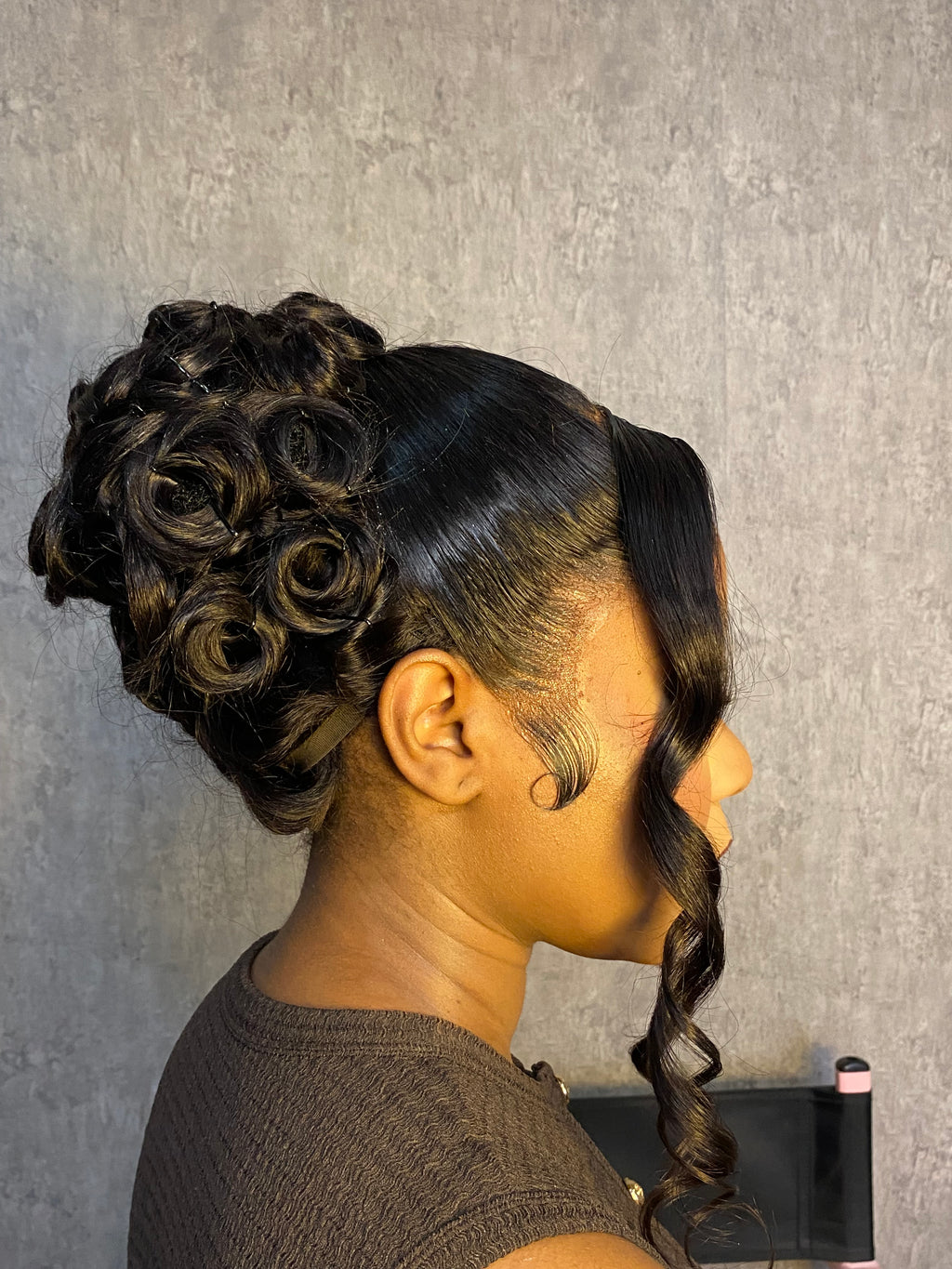 Bombshell French roll updo with bangs